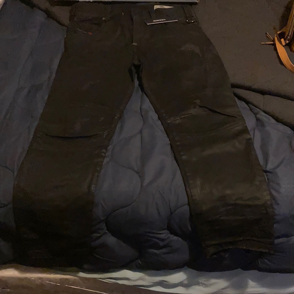Diesel black jeans with zippers on back of ankle